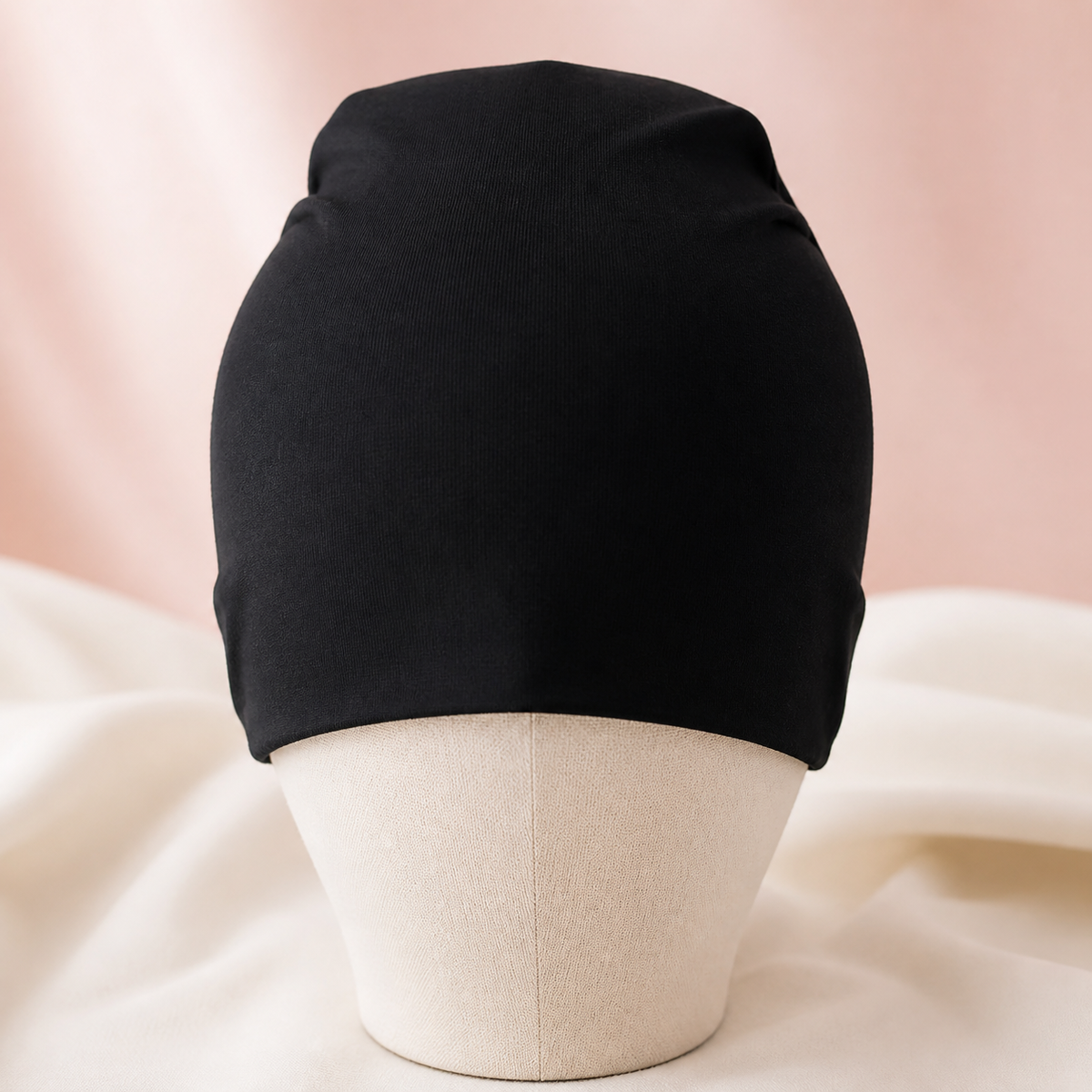 Cool and Calm Period Head Wrap on a blush pink studio background