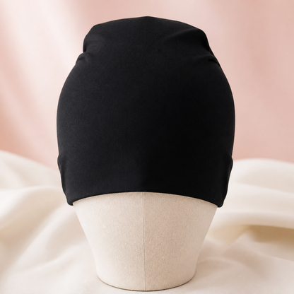 Cool and Calm Period Head Wrap on a blush pink studio background