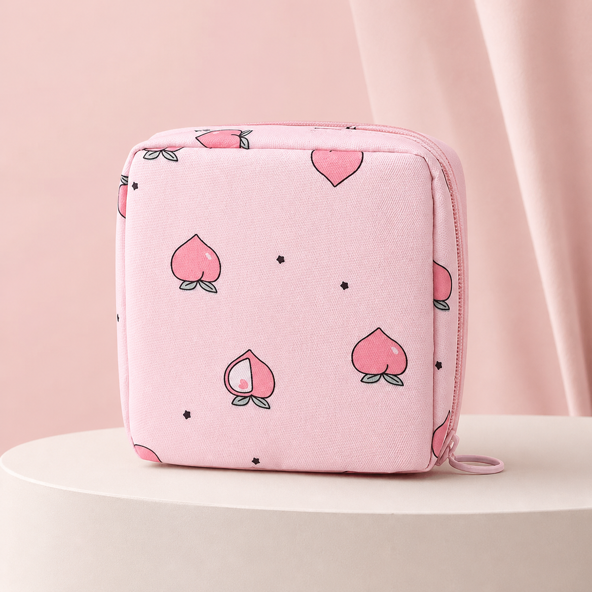 Discreet Period Essentials Pouch on a blush pink studio background