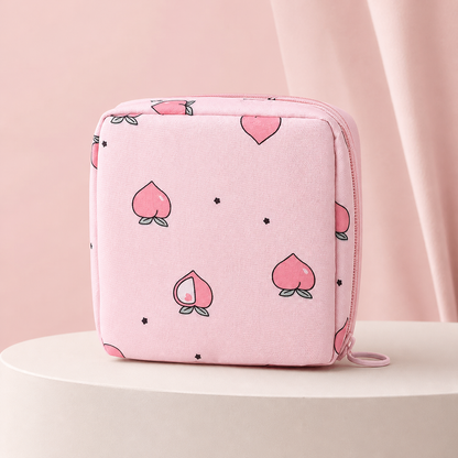 Discreet Period Essentials Pouch on a blush pink studio background
